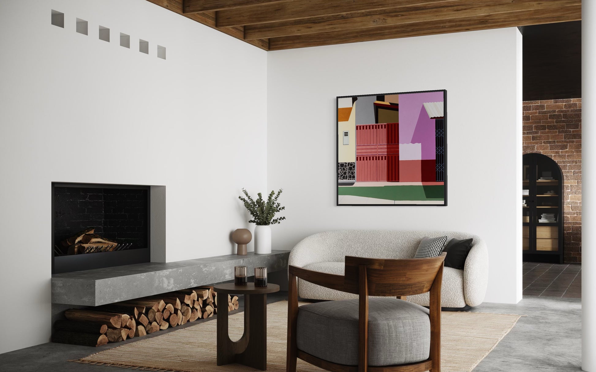Modern living room with a fireplace, Modern living room with a sofa, coffee table, and Gordon Leverton original art on the wall.