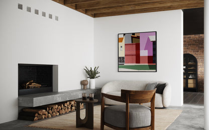 Modern living room with a fireplace, Modern living room with a sofa, coffee table, and Gordon Leverton original art on the wall.