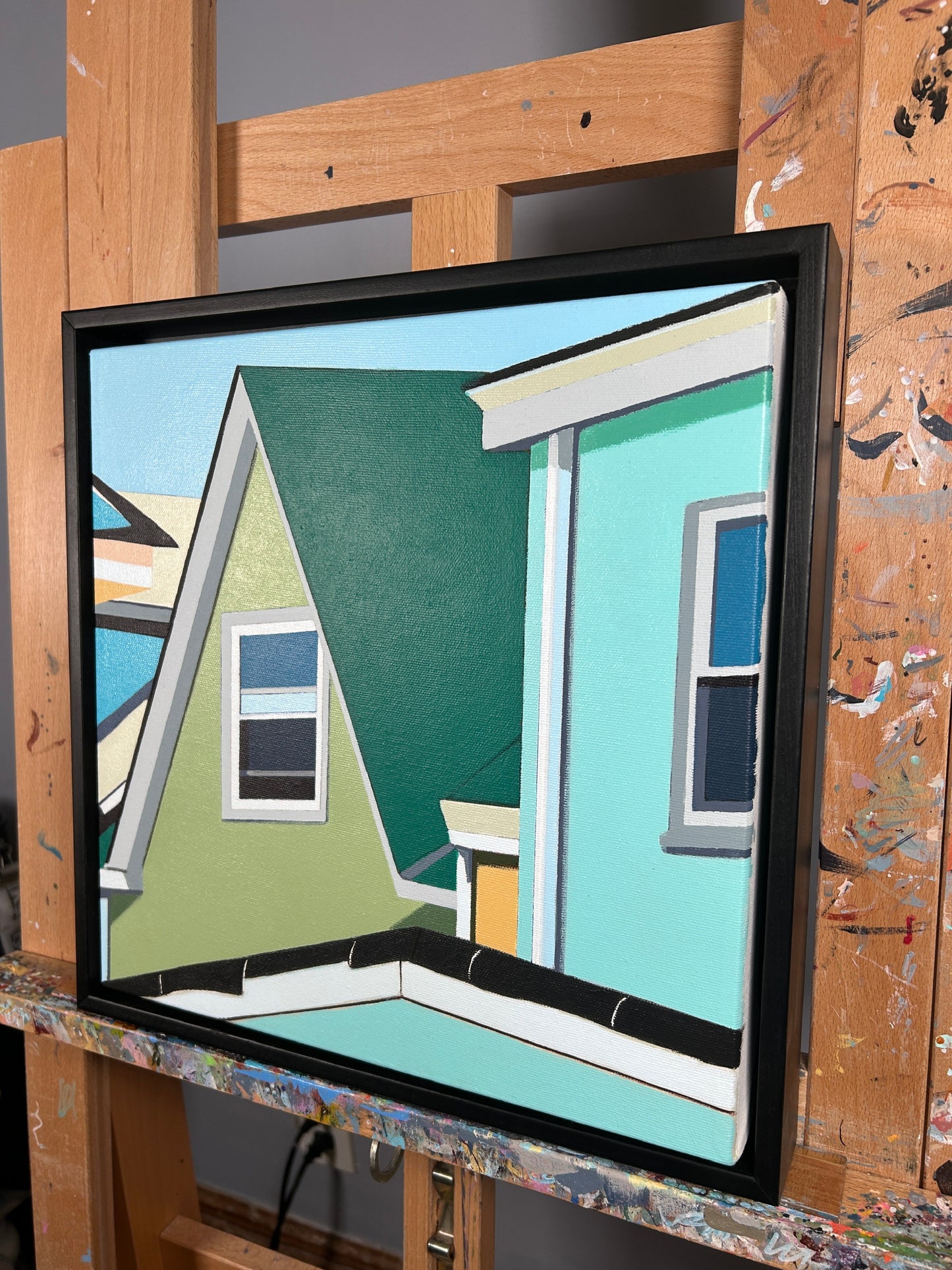 Gordon Leverton - Original Artwork

12x12' artwork  - Framed
Colorful houses with green, blue, and yellow facades on a clear sky background