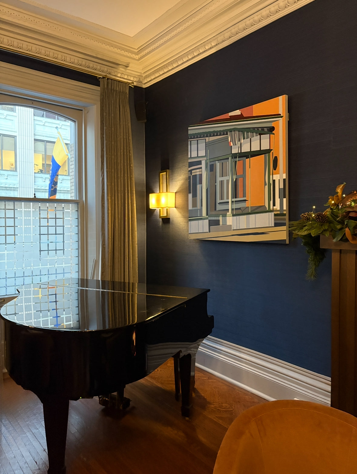 Photo taken of Vintage Charm, Gordon Leverton in The Hamilton Club, Hamilton, Canada in December 2025. Original acrylic painting Vintage Charm by Gordon Leverton depicting 313 Barton Street corner building in Hamilton with historic storefront architecture - Grocery Store for over 73 years.